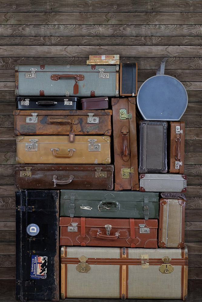 Wandbild Stacked Suitcases - Pile