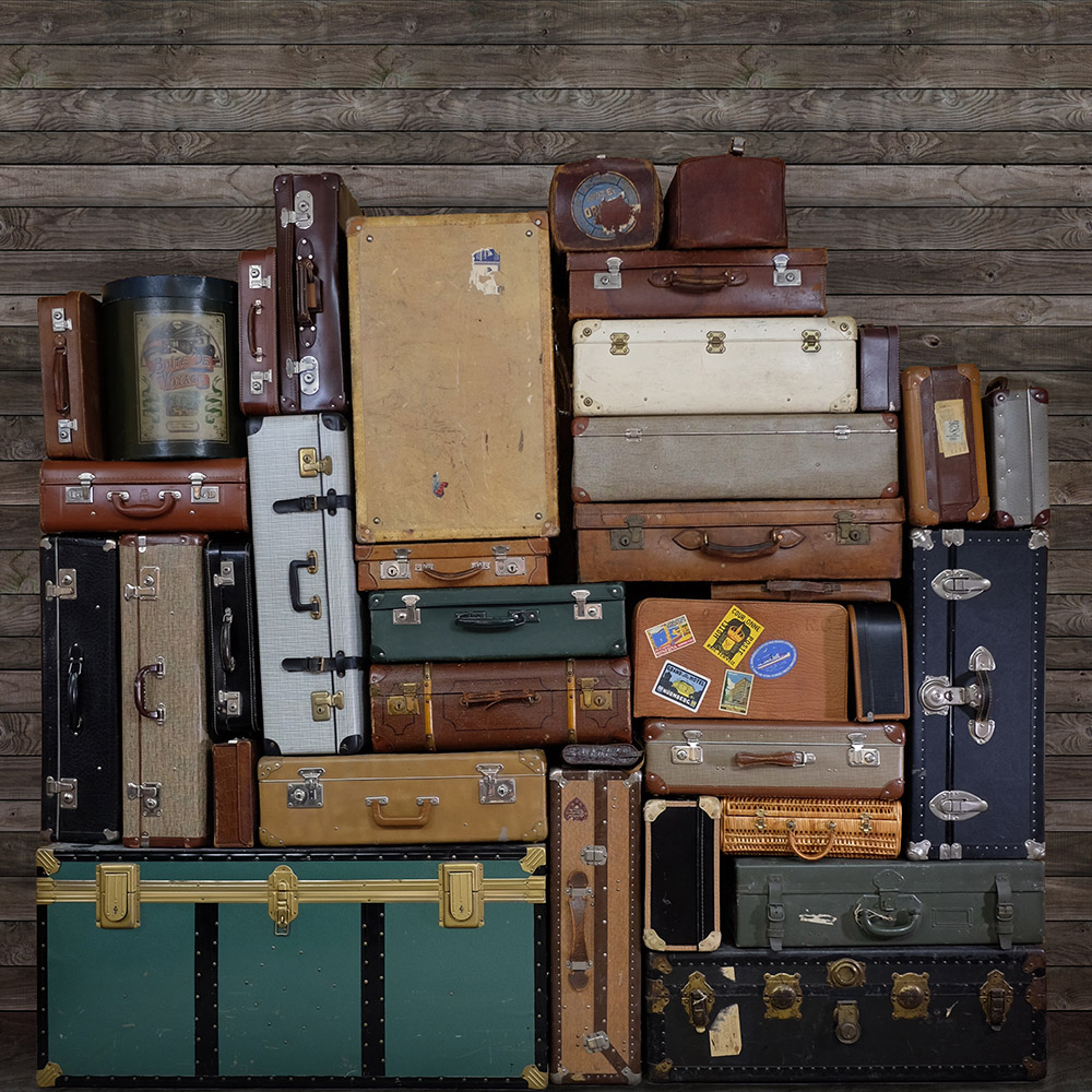 Wandbild Stacked Suitcases - Heap